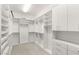 Spacious walk-in closet with custom shelving and drawers at 39 Coralwood Dr, Las Vegas, NV 89135