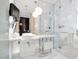 Bright bathroom with dual vanities, marble countertops, walk-in shower and modern fixtures at 4381 W Flamingo Rd # 38303, Las Vegas, NV 89103