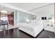 Bright bedroom featuring a plush bed and modern decor, with a view into the kitchen area at 4381 W Flamingo Rd # 38303, Las Vegas, NV 89103