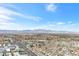 Beautiful city view from the condo with mountains visible in the distance and bright blue sky above at 4381 W Flamingo Rd # 38303, Las Vegas, NV 89103