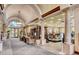 Elegant clubhouse interior with stone columns and access to fitness center equipment at 4956 Momenti St, Las Vegas, NV 89135