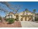 Charming single-story home with mature landscaping and a two-car garage in a well-kept neighborhood at 4956 Momenti St, Las Vegas, NV 89135
