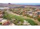 Scenic aerial shot showcasing a golf course community with beautiful homes and desert landscape views at 5 Circa De Montanas, Henderson, NV 89011