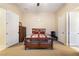 Cozy bedroom with a comfortable bed and three entryways, including two doors at 5 Circa De Montanas, Henderson, NV 89011