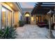Charming outdoor courtyard with comfortable seating and a lovely pergola at 5 Circa De Montanas, Henderson, NV 89011