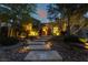 Inviting stone steps lead to the illuminated entryway of this charming home at 5 Circa De Montanas, Henderson, NV 89011