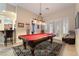 Fun game room with a red pool table and comfortable seating at 5 Circa De Montanas, Henderson, NV 89011
