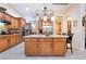 Spacious kitchen features a large island, stainless steel appliances, and ample cabinetry at 5 Circa De Montanas, Henderson, NV 89011