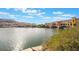 Scenic daytime view of Lake Las Vegas, showcasing the colorful architecture and waterfront access at 5 Circa De Montanas, Henderson, NV 89011