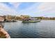 Lakefront docks with boats, yachts, and kayaks along the water, showcasing waterfront recreational amenities at 5 Circa De Montanas, Henderson, NV 89011
