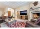 Inviting living area featuring a fireplace, comfortable seating, and modern touches at 5 Circa De Montanas, Henderson, NV 89011