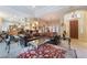 Spacious living room with seamless access to the kitchen and outdoor patio at 5 Circa De Montanas, Henderson, NV 89011