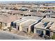 Aerial view of the community with the Las Vegas skyline in the background at 5030 Sandline Court, Las Vegas, NV 89135