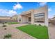 Exterior backyard with patio, lawn and landscaping at 5030 Sandline Court, Las Vegas, NV 89135