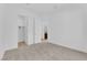 Spacious bedroom boasts walk-in closet and bathroom access, offering convenience and privacy at 5030 Sandline Court, Las Vegas, NV 89135