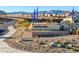 A stone sign that reads 'Incline' with desert landscaping and mountain views at 5030 Sandline Court, Las Vegas, NV 89135