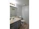 Cozy bathroom with a single sink vanity, toilet and a functional layout at 516 Sellers Pl, Henderson, NV 89011