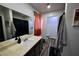 This bathroom features hardwood floors, neutral paint, and a walk-in laundry closet at 516 Sellers Pl, Henderson, NV 89011