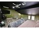 This bedroom features hardwood floors, a ceiling fan, and an upstairs loft space at 516 Sellers Pl, Henderson, NV 89011