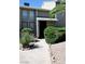 Charming condo with well-maintained landscaping and inviting entryway on a sunny day at 516 Sellers Pl, Henderson, NV 89011
