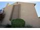Exterior of building with vertical wood detail and the building number 12 at 516 Sellers Pl, Henderson, NV 89011