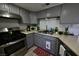 Updated kitchen featuring stainless steel appliances and efficient design at 516 Sellers Pl, Henderson, NV 89011