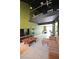 Inviting living area with tiled floors, a balcony feature and comfortable seating at 516 Sellers Pl, Henderson, NV 89011