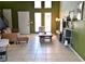 Open-concept living area featuring tile flooring, high ceilings, and plenty of natural light at 516 Sellers Pl, Henderson, NV 89011