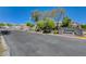 Entrance to Cactus Square II with landscaping and gated access at 5245 Sand Dollar Ave, Las Vegas, NV 89141