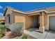 Inviting front porch showcases a stylish entrance with a gray door and a cozy, covered entryway at 5245 Sand Dollar Ave, Las Vegas, NV 89141