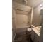 Clean bathroom with a shower-tub combo, single sink vanity, and modern fixtures at 5937 Armide St, North Las Vegas, NV 89081