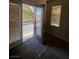 Cozy bedroom with private balcony access and plenty of natural light at 5937 Armide St, North Las Vegas, NV 89081