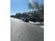 Street view of homes on a bright, sunny day with multiple cars parked on the side of the street at 5937 Armide St, North Las Vegas, NV 89081