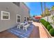 Entertain in this backyard that has a picnic table, outdoor seating and built-in garden beds at 6129 Flaming Arrow Rd, North Las Vegas, NV 89031