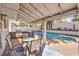 Relaxing backyard with a refreshing pool and outdoor kitchen at 6129 Flaming Arrow Rd, North Las Vegas, NV 89031