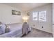 Cozy bedroom with natural light and neutral decor at 6129 Flaming Arrow Rd, North Las Vegas, NV 89031