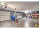 Spacious three car garage with ample storage shelving at 6129 Flaming Arrow Rd, North Las Vegas, NV 89031