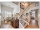 Open floor plan with wine storage under staircase leading up to the second floor at 6129 Flaming Arrow Rd, North Las Vegas, NV 89031