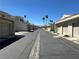 Straight shot of garages across the street, with a view of the Nevada desert landscape in the background at 6250 W Flamingo Rd # 143, Las Vegas, NV 89103