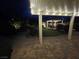 Spacious backyard has outdoor seating areas, a pergola, and brick pavers at 6656 Fort William St, North Las Vegas, NV 89084