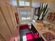 Bathroom with a glass-enclosed shower, modern vanity, and neutral color scheme at 6656 Fort William St, North Las Vegas, NV 89084