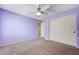 View of a cozy bedroom featuring carpet and a closet at 6656 Fort William St, North Las Vegas, NV 89084