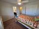 This bedroom features a closet and connected bathroom at 6656 Fort William St, North Las Vegas, NV 89084