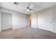 View of the bedroom with carpet and white colored closet at 6656 Fort William St, North Las Vegas, NV 89084