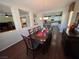 Dining area with a large table and seamless connection to the kitchen and living room at 6656 Fort William St, North Las Vegas, NV 89084