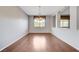 Dining room features hardwood floors, neutral colors, and natural lighting at 6656 Fort William St, North Las Vegas, NV 89084