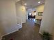 Open-concept entryway with tile flooring leading into the home's living spaces at 6656 Fort William St, North Las Vegas, NV 89084