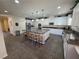 Spacious kitchen with granite countertops, stainless steel appliances and large kitchen island at 6656 Fort William St, North Las Vegas, NV 89084