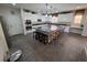 Large kitchen with a central island, granite countertops, and stainless steel appliances at 6656 Fort William St, North Las Vegas, NV 89084