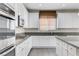 Kitchen with stainless steel appliances and granite countertops at 6656 Fort William St, North Las Vegas, NV 89084